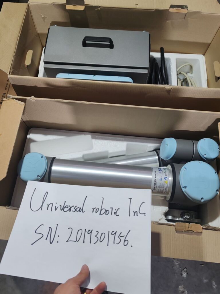 Universal Robot UR10 collaborative robot in an industrial setting, showcasing its versatility and ease of use.