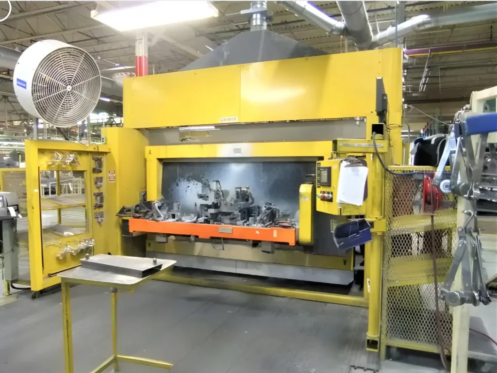 Genesis Versa 4M welding cell with dual FANUC Arc Mate 100iC robots